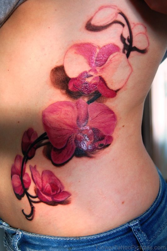 Classic Pink Orchid Flower Tattoo On Rib
