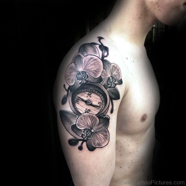 Compass With Orchid Flowers Tattoo Design