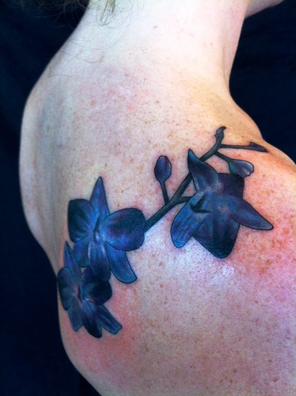 Dark Blue Orchid Flowers Tattoo On Shoulder