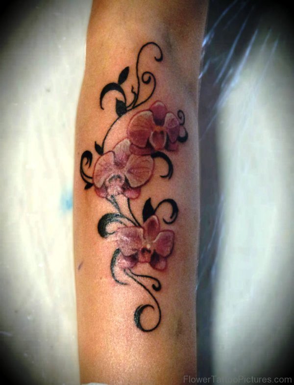 Dazzling Orchid Flower Tattoo On Arm