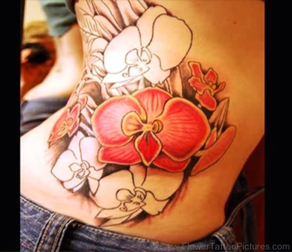 Delightful Orchid Flower Tattoo On Rib