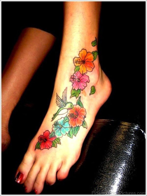 Flying Humming Bird With Orchid Flower Tattoo