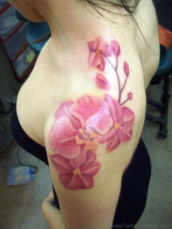 Gorgeous Pink Orchid Flower Tattoo On Shoulder