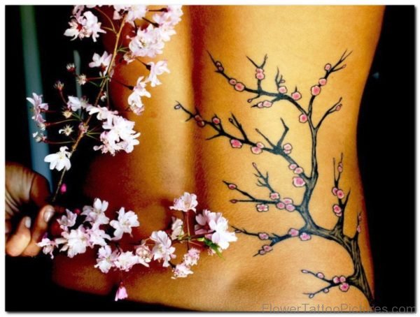 Impressive Orchid Flower Tattoo On Back