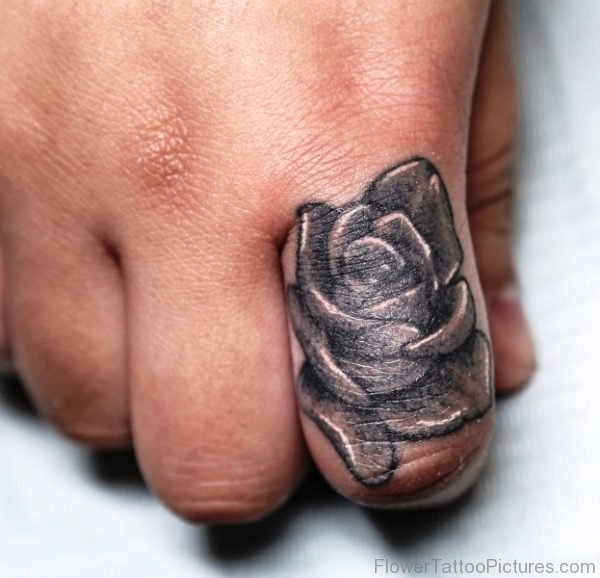 Amazing Rose Tattoo On First Finger