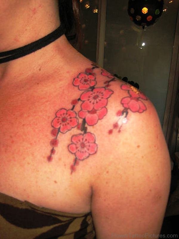 Beautiful Pink Flowers Tattoo Design On Shoulder