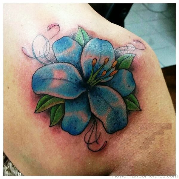 Blue Lily Tattoo On Back Shoulder