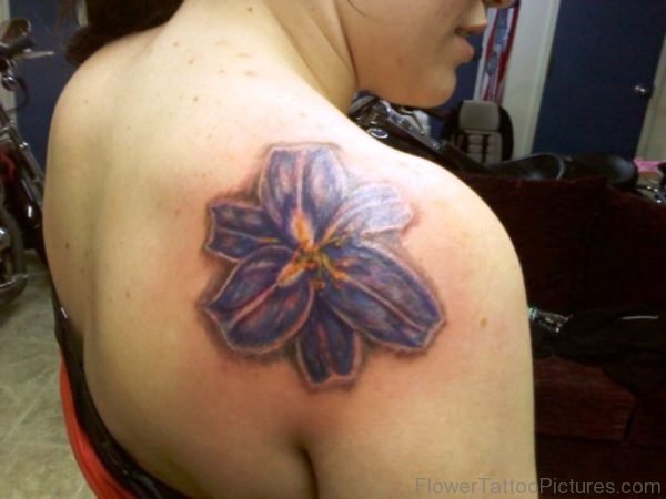 Blue Lily Tattoo On Right Shoulder