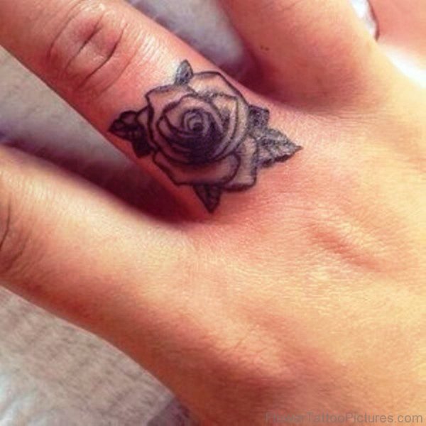 Cute Rose Tattoo On Middle Finger