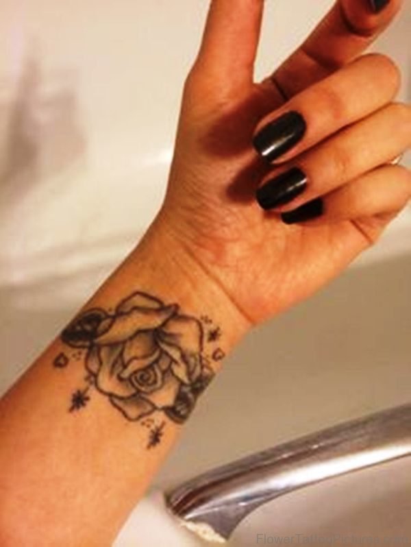 Elegant Black Rose Tattoo On WrisT