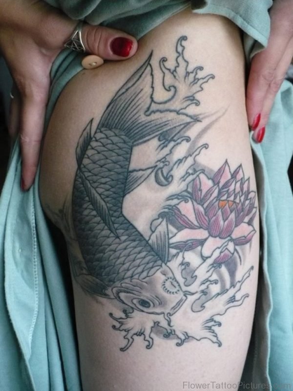 Fish And Lotus Tattoo On Thigh