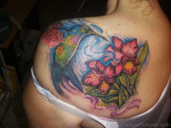 Hummingbird Flying On Flowers Tattoo
