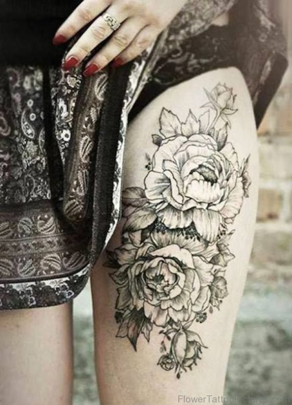 Nice Flower Tattoo On Thigh