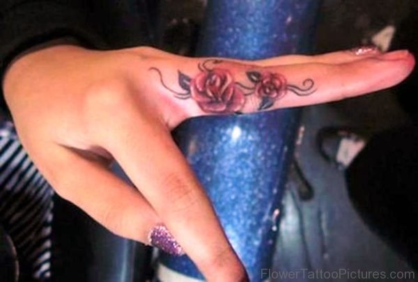 Nice Roses Tattoo On Finger