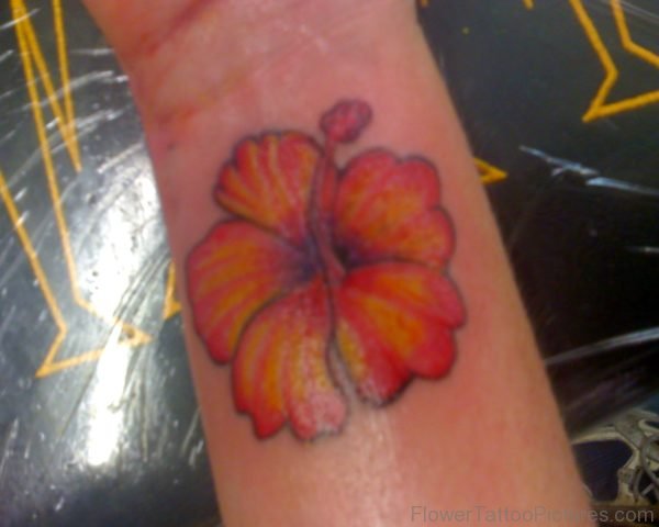 Orange Hibiscus Wrist Tattoo