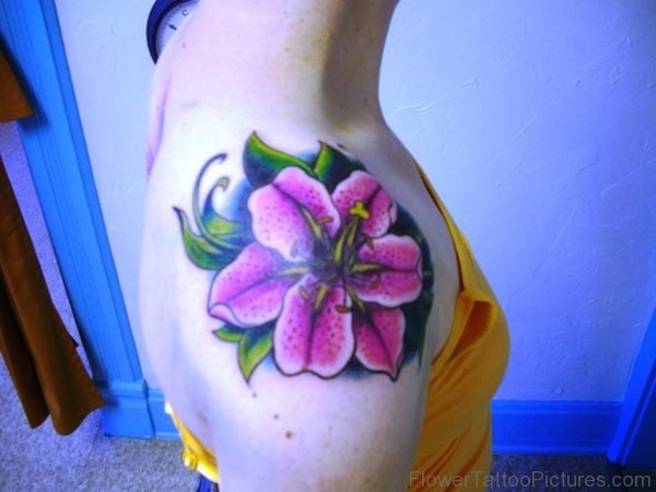 Pink Flower Tattoo On Front Shoulder