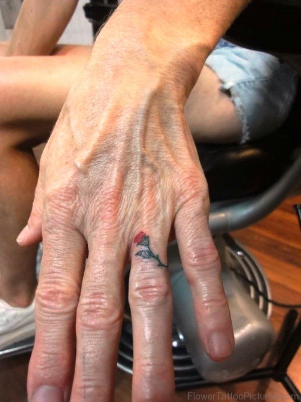 Small Rose Tattoo On Ring Finger