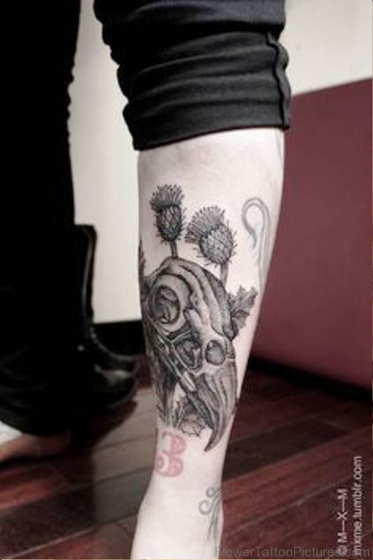 Alpine Thistle With Skull Tattoo On Leg