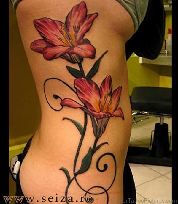 Amaryllis Flower Rib Tattoo