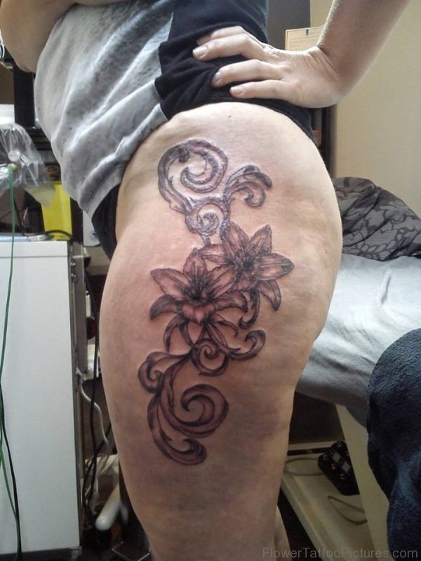Amazing Amaryllis Tattoo On Thigh