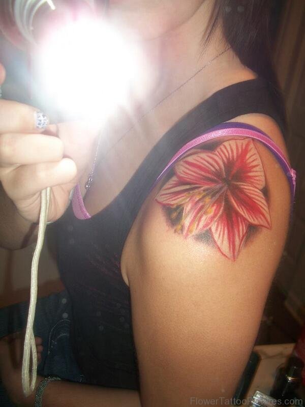 Awesome Red Amaryllis Tattoo On Shoulder