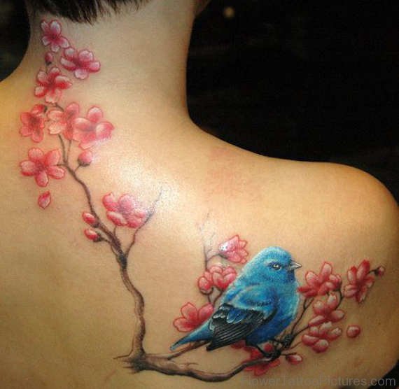 Beautiful Blue Bird And Blossom Flower Tattoo