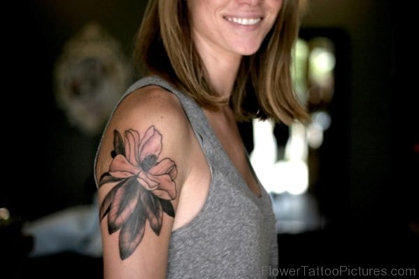 Black And Grey Magnolia Tattoo On Right Shoulder