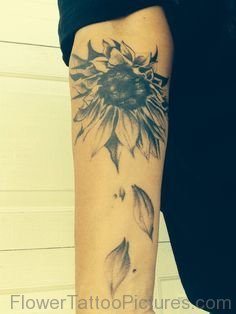 Black And Grey Sunflower Tattoo On Arm