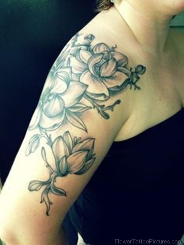 Black And White Magnolia Tattoo On Shoulder