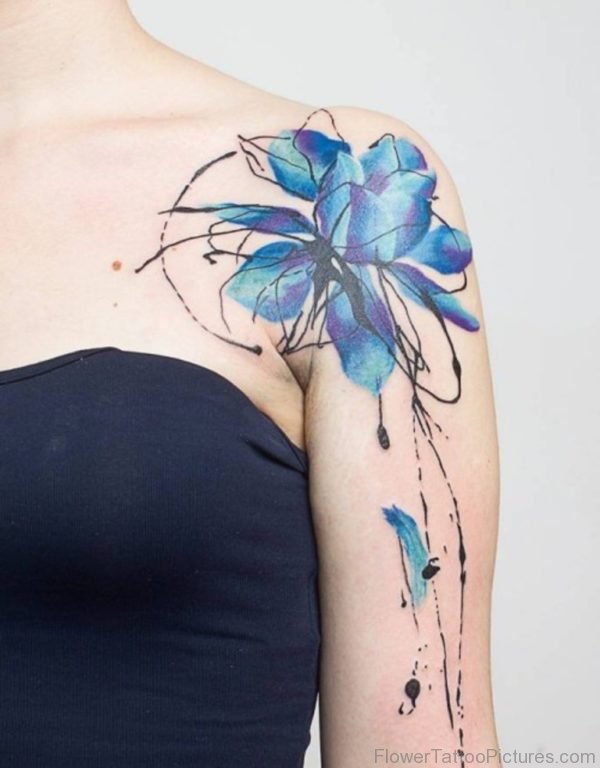 Blue Colored Tattoo On Front Shoulder