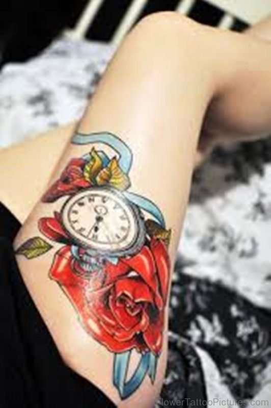 Captivating Clock And Thigh Rose Tattoos