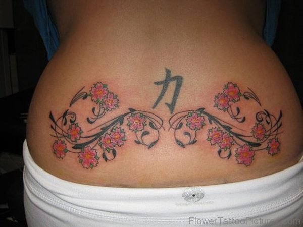 Cool Flowers Tattoo On Lower Back