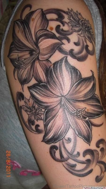 Dark Grey Amaryllis Flower Tattoo On Arm
