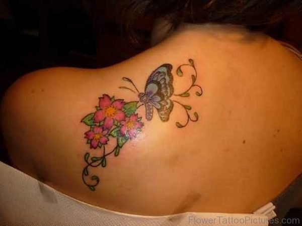 Fabulous Blue Butterfly And Pink Flower Tattoo Design On Upper Back