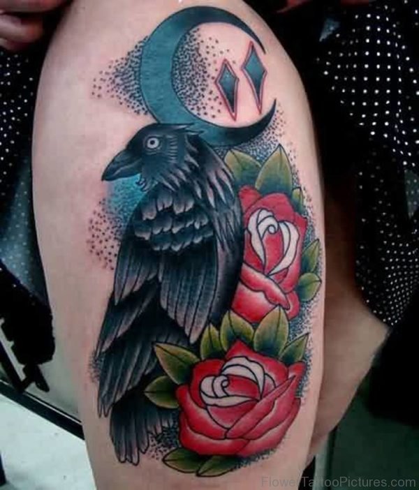 Gorgeous Crow And Rose Tattoos On Thigh