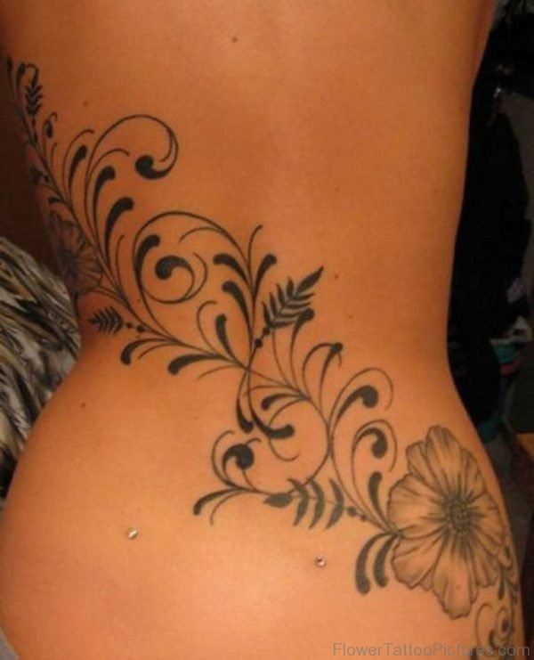 Grey Flower Tattoo On Lower Back