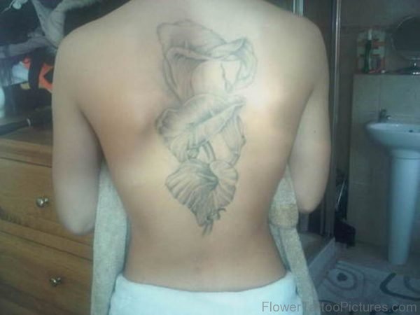 Grey Lily Flower Tattoo On Back