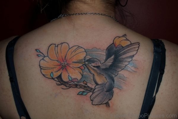 Hummingbird n Flower Tattoo On Upper Back