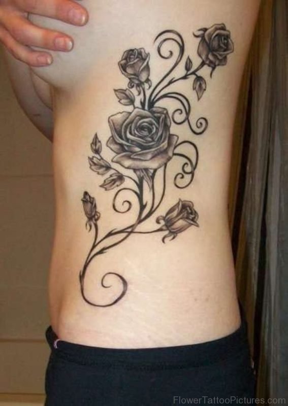 Nice Rose Tattoo On Rib