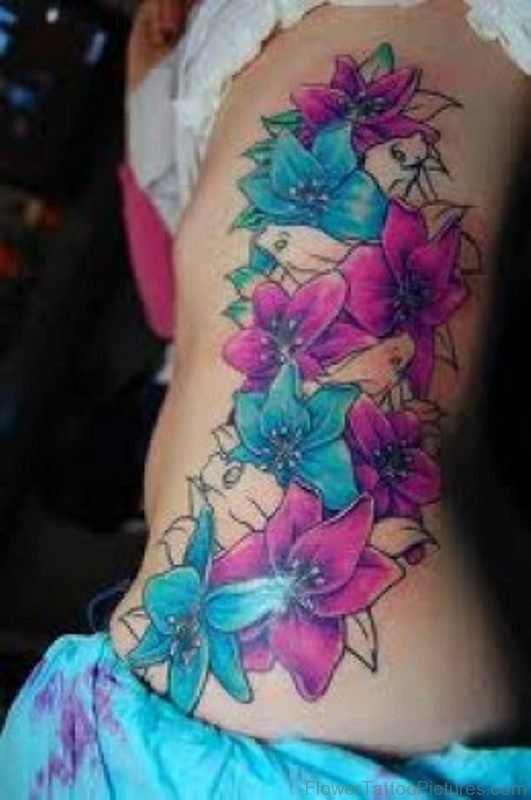 Pink And Blue Amaryllis Flowers Tattoo