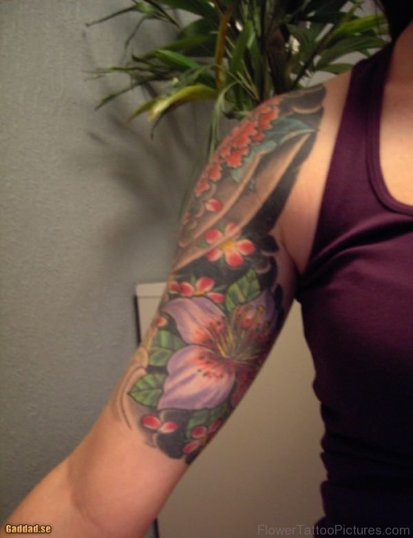 Purple Amaryllis Flower Tattoo On Under Arm