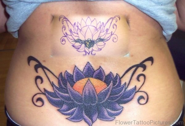 Purple Ink Lotus Flower Tattoo On Lower Back