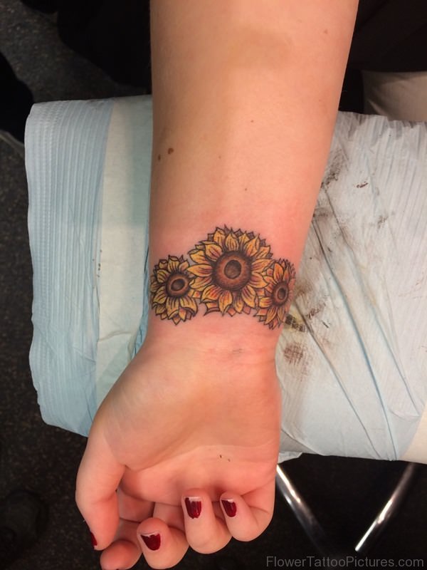 Sunflowers Band Tattoo On Wrist