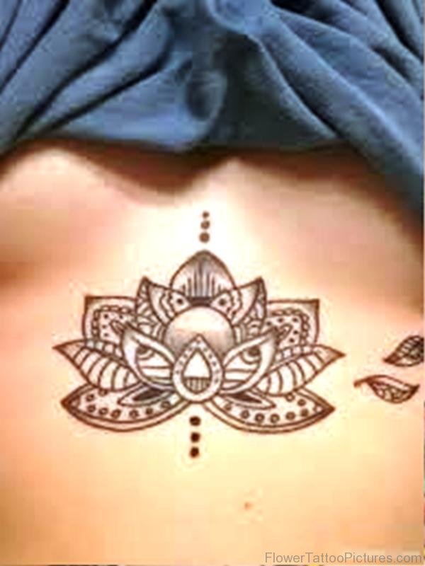 Tribal Lotus Tattoo On Chest