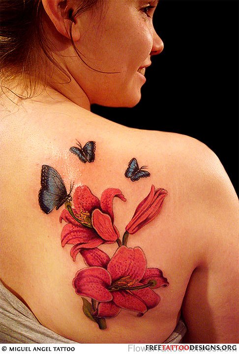 Kanji And Cherry Blossom Tattoo On Womans Back
