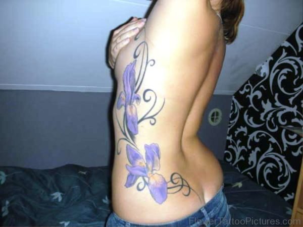Big Iris Flower Tattoo Design On Rib
