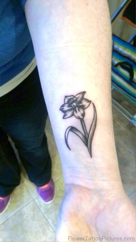 Black Daffodil Tattoo On Wrist
