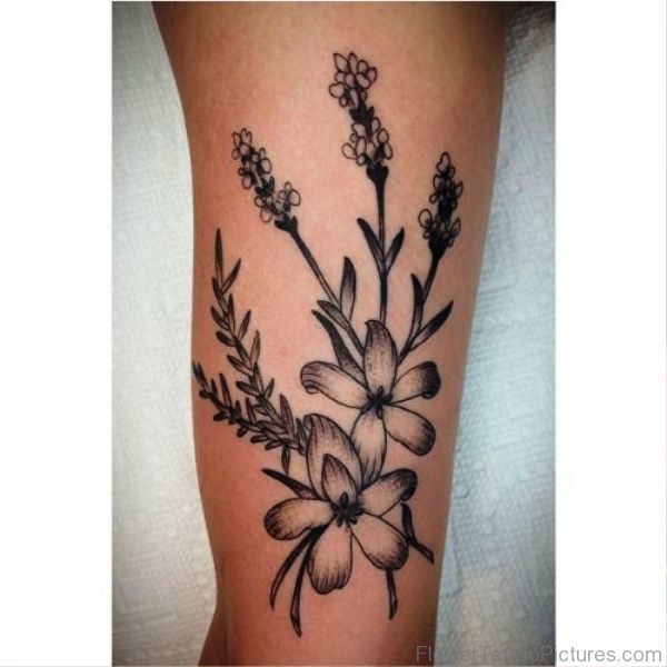 Black Inked Larkspur Flower Tattoo On Leg
