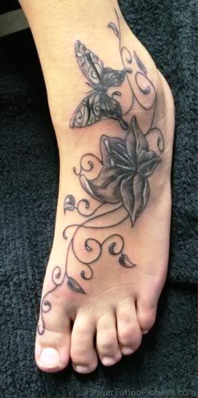 Black Larkspur Flower Tattoo With Butterfly