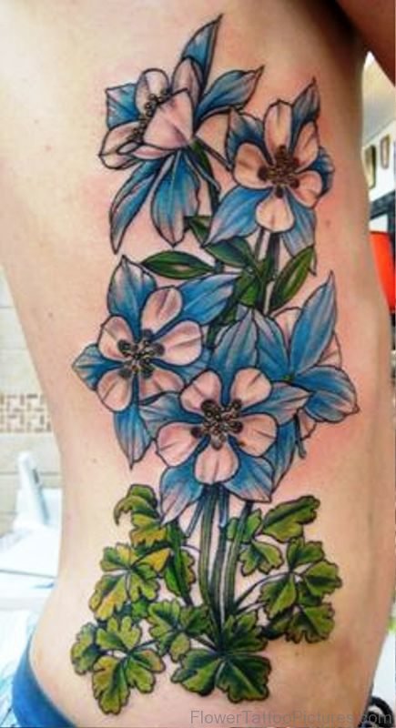 Blue Columbine Flowers Tattoo On Rib.